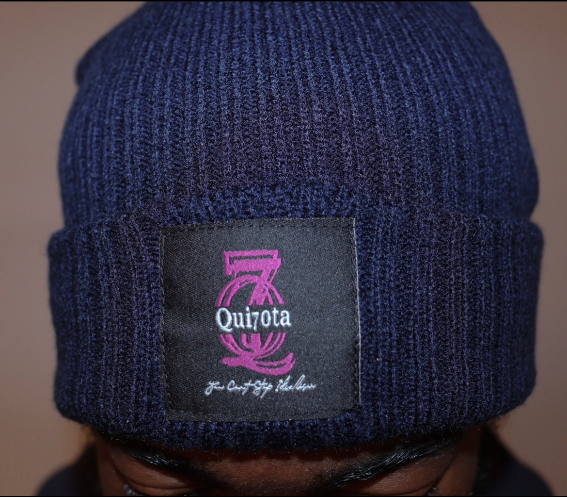 "Navy Q7 Logo Beanie (Special Edition) featuring an embroidered Q7 logo on the front. Made from soft, warm knit fabric, this beanie offers a snug, comfortable fit and a minimalist design, perfect for adding a stylish touch to your winter wardrobe."

